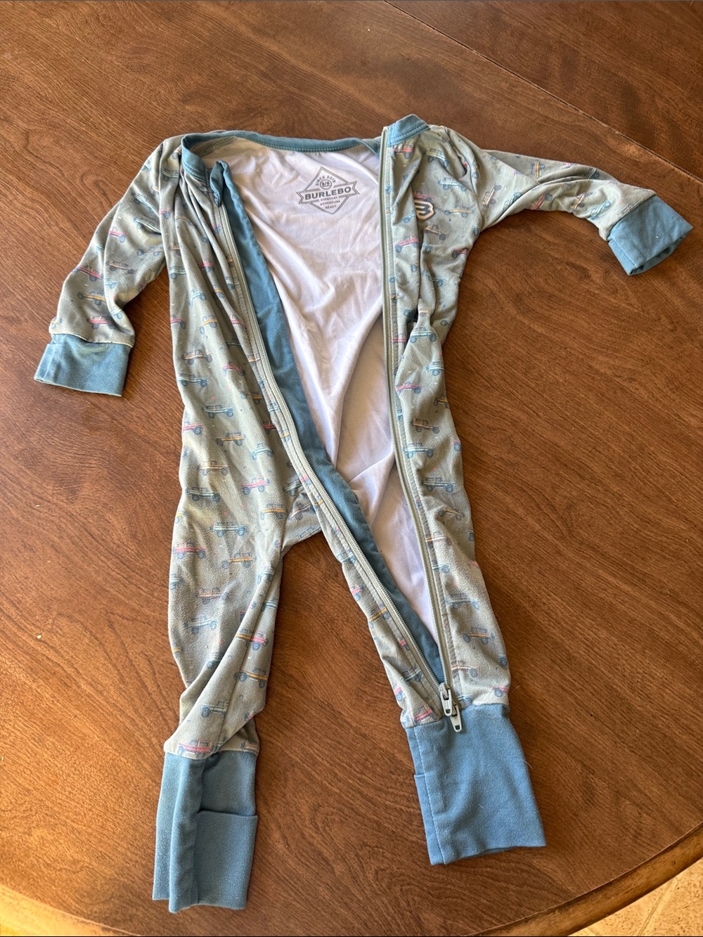 BURLEBO Light Blue Zip Footed One-Piece with Scooter Print